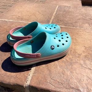 Light Blue with pink stripe Crocs. Size Womens 8